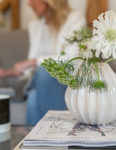 a vase of flowers in an interior design studio during a personal brand photography shoot in surrey