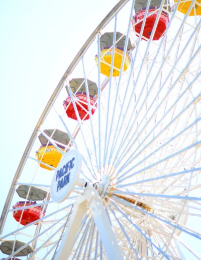 a ferris wheel on santa monica pier during a travel photography shoot in LA
