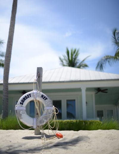 a life buoy on the beach at sunset key island during a travel photography shoot in florida