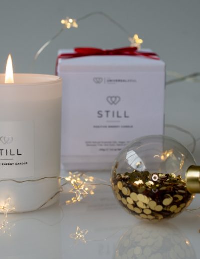 Scented candle in a christmas set during a product photography shoot in surrey