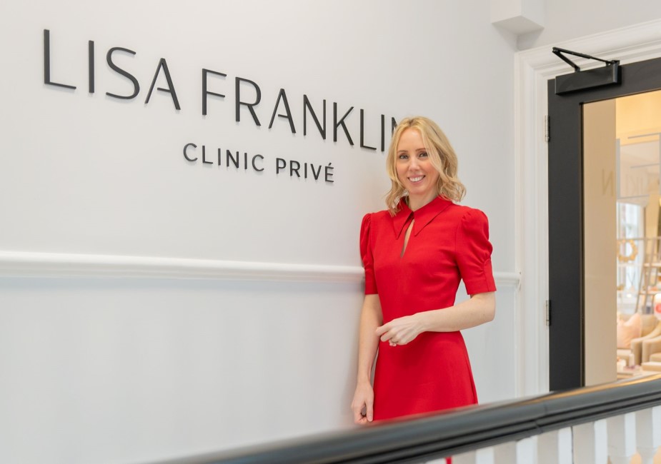 young woman in red dress during a personal branding photography shoot in london