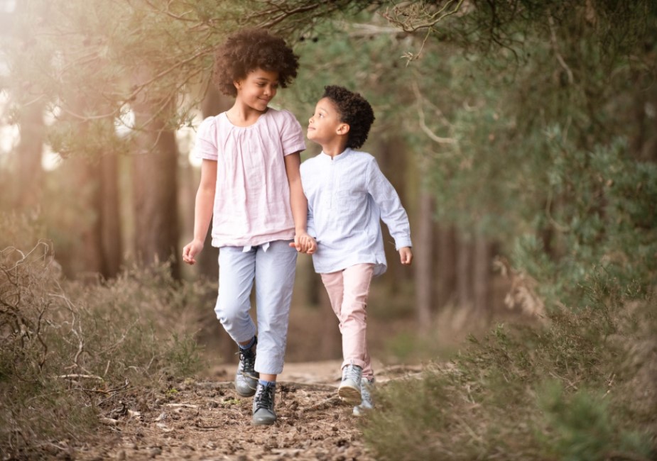 children strolling in the park in a family photo shoot in surrey