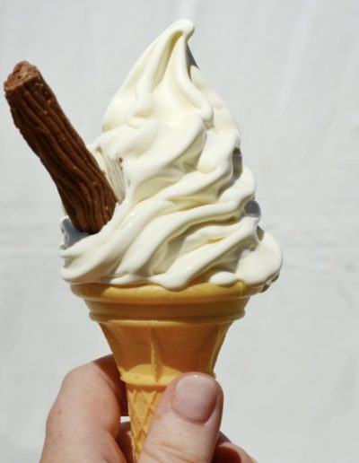 an ice cream cone with a chocolate flakle