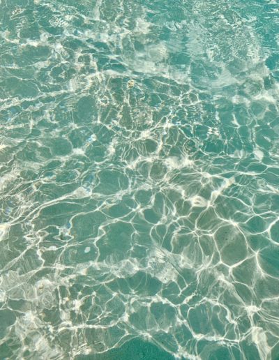 turquoise sea shot by travel photographers surrey social stock photography