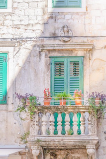 pastel shutters on a house in croatia