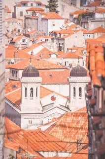 orange roofs of a town in croatia shot by travel photographers surrey social stock phtogoraphy