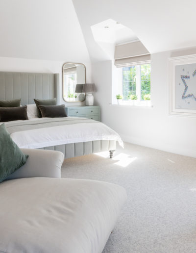 a bright and airy bedroom styled for an interior photography shoot in surrey