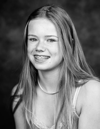 a young actor poses for a headshot photo with surrey headshot photographers surrey social stock photography