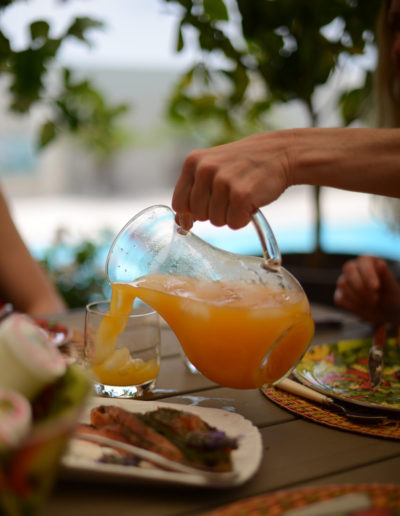 a group of friends enjoy an al fresco lunch during a hospitality photo shoot by surrey social stock photography