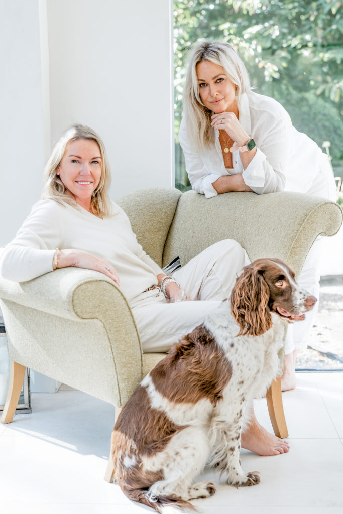 two women and a dog during a personal branding photo shoot with surrey social stock photography