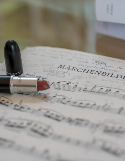 a sheet of music with a lipstick on it