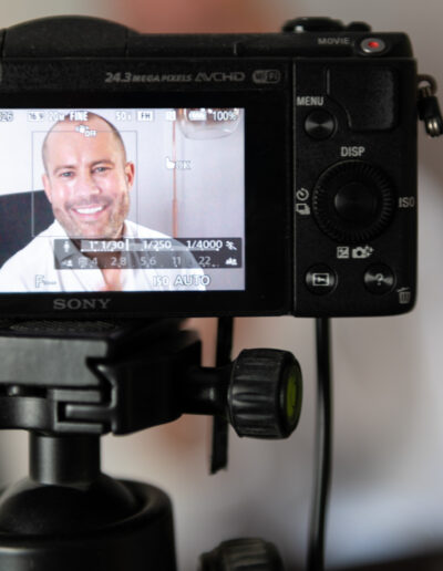 a man talks to camera during a zoom recording
