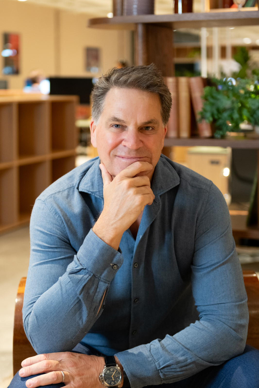 a businessman posing for his corporate headshot