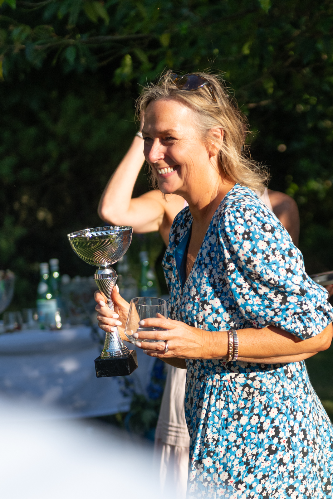 SHCCroquet-101 a woman wins a prize at a summer corporate event